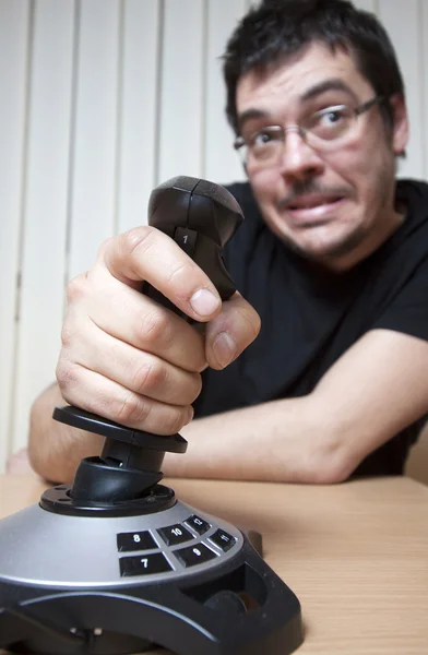 Funky man with a joystick - focus on joystick — Stock Photo, Image