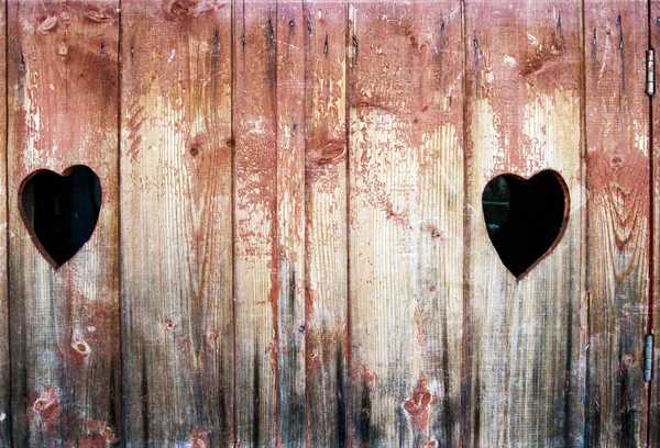 Foto vintage de dois corações em madeira — Fotografia de Stock