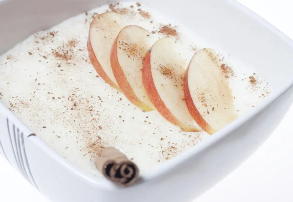 Rice pudding with apple and cinnamon — Stock Photo, Image