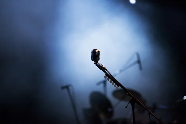 Microphone in stage lights — Stock Photo, Image