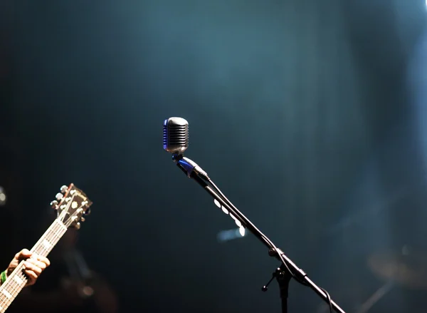 Microphone in stage lights — Stock Photo, Image