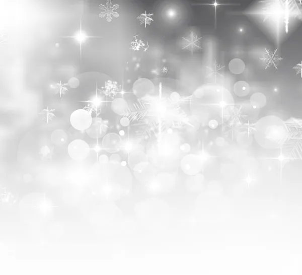 Light abstract Christmas background with white snowflakes — Stock Photo, Image