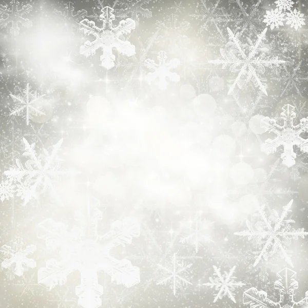 抽象的なクリスマスの背景と白い雪の結晶 — ストック写真
