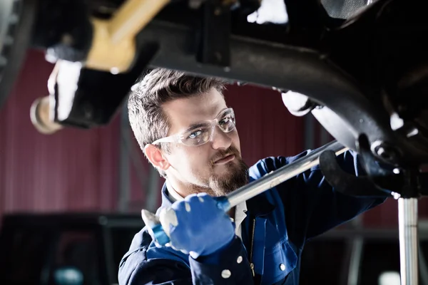 Handsome car mechanic at work — Stock Photo, Image