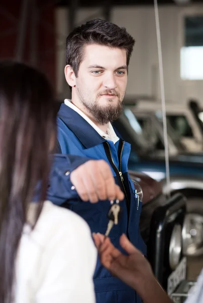 Handsome car mechanic at work — Stock Photo, Image