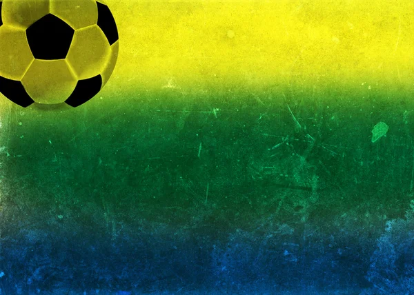 Bola de futebol e bandeira do Brasil — Fotografia de Stock
