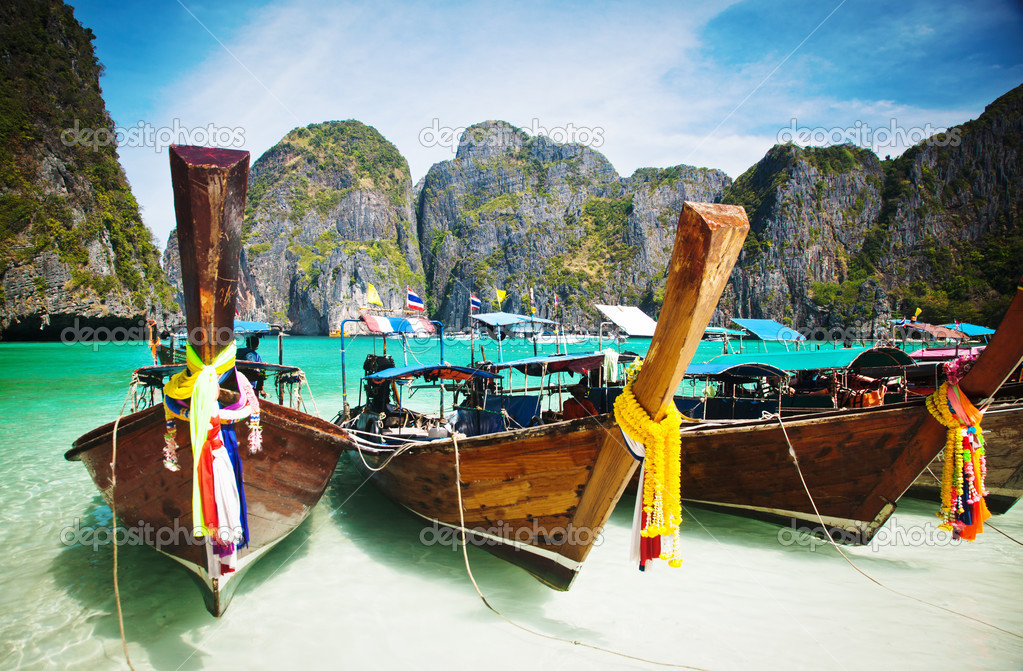  Thailand ocean landscape. Exotic beach view and traditional shi