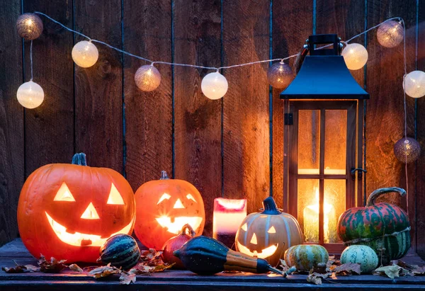 Halloween Jack Lanterns Candles String Lights Wooden Table — Stok Foto