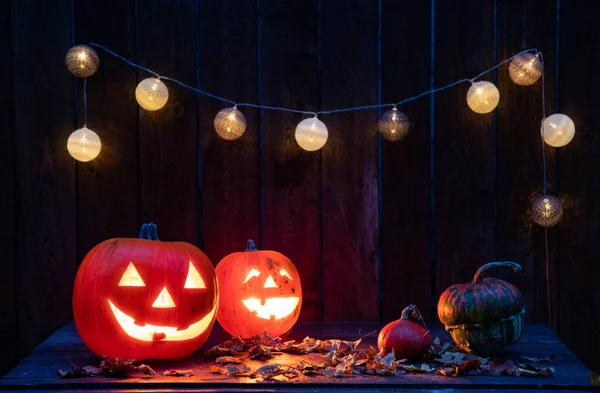 Halloween Jack Lanterns Velas Luces Cuerda Mesa Madera — Foto de Stock