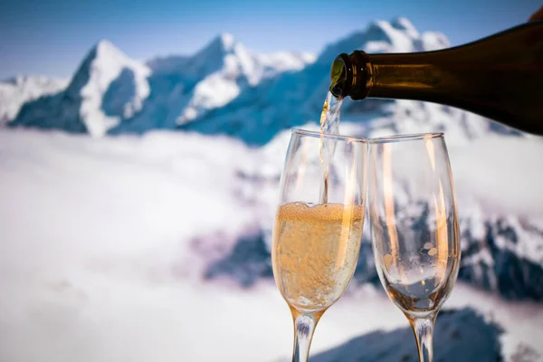 Champagne Glasses Snowy Peaks Background New Year Stock Image