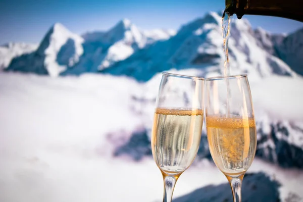 Champagne Glasses Snowy Peaks Background New Year Stock Picture