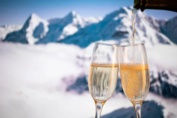 Champagne Glasses Snowy Peaks Background New Year Royalty Free Stock Images