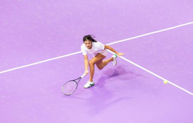CLUJ-NAPOCA, ROMANIA - 23 OCT 2021: Emma Raducanu of Great Britain  in action during  a match at WTA Transylvania Open International Tennis Tournament.