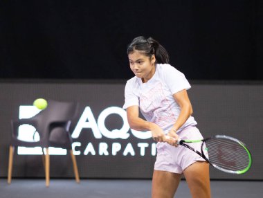 CLUJ-NAPOCA, ROMANIA - 23 OCT 2021: Emma Raducanu of Great Britain  in action during  a match at WTA Transylvania Open International Tennis Tournament.