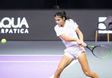 CLUJ-NAPOCA, ROMANIA - 23 OCT 2021: Emma Raducanu of Great Britain  in action during  a match at WTA Transylvania Open International Tennis Tournament.