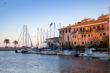 VALENCIA , SPAIN - DECEMBER 8, 2021: traditional buildings of Port Saplaya  the Little Venice near Valencia  Spain