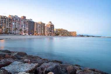 VALENCIA , SPAIN - DECEMBER 8, 2021: traditional buildings of Port Saplaya  the Little Venice near Valencia  Spain