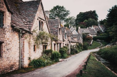 traditional Cotswold cottages in England  UK. Bibury is a village and civil parish in Gloucestershire  England.