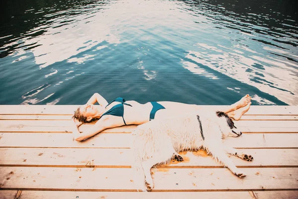 Woman White Dog Sunbathing Lake — Stock Photo, Image