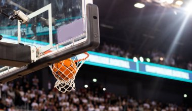 basketball game ball in hoop