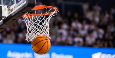 basketball game ball in hoop