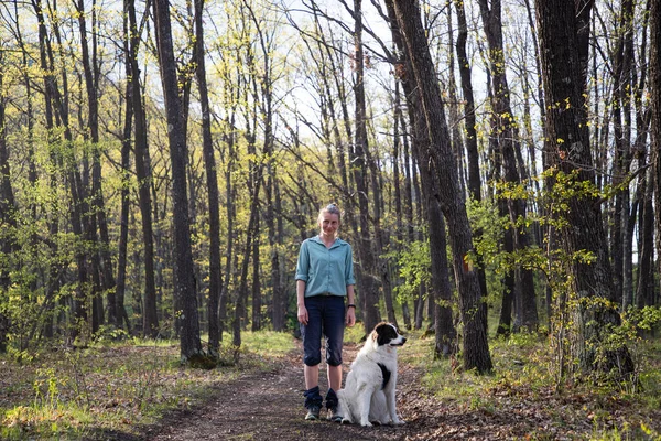 Woman Trekking Forest Dog — стоковое фото