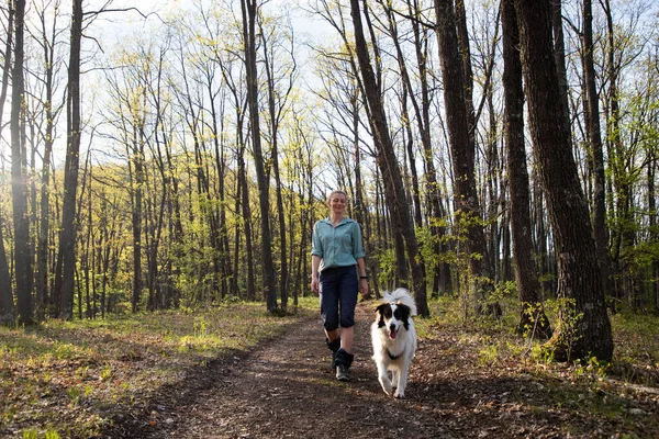 Woman Trekking Forest Dog — стоковое фото