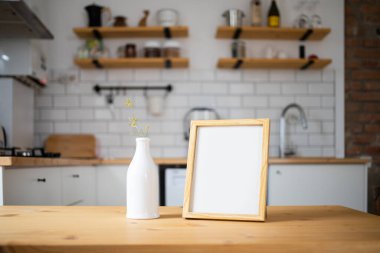 empty frame on modern kitchen table mock up space for your text