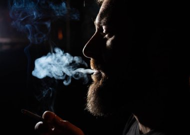 addicted man smoking a cigarette quit smoking