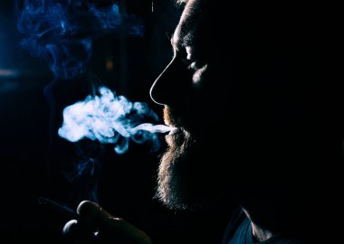 addicted man smoking a cigarette quit smoking