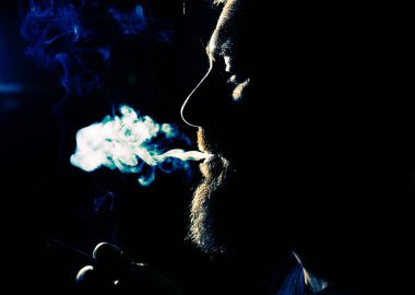 addicted man smoking a cigarette quit smoking