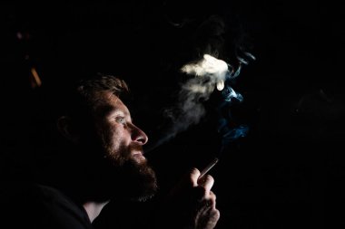 addicted man smoking a cigarette quit smoking