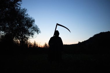 grim reaper, the death itself, scary horror shot of Grim Reaper holding scythe