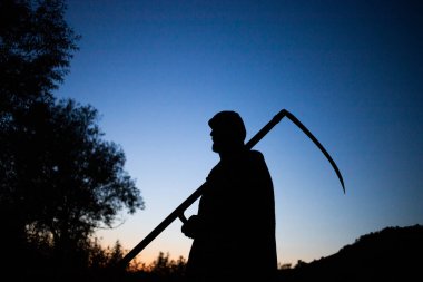 grim reaper, the death itself, scary horror shot of Grim Reaper holding scythe