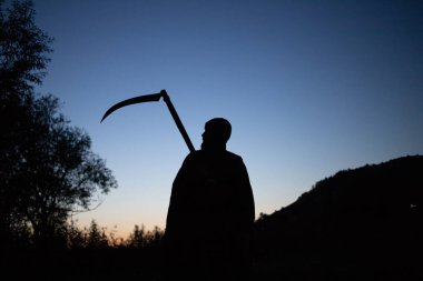 grim reaper, the death itself, scary horror shot of Grim Reaper holding scythe