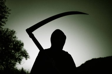 grim reaper, the death itself, scary horror shot of Grim Reaper holding scythe