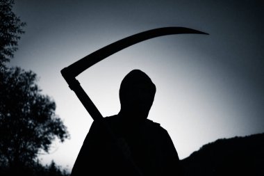grim reaper, the death itself, scary horror shot of Grim Reaper holding scythe