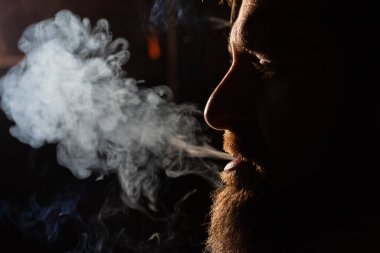 addicted man smoking a cigarette quit smoking