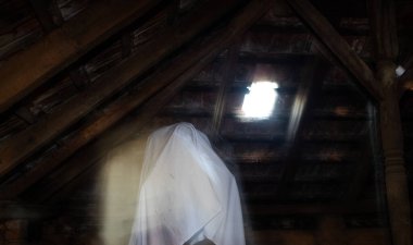blurred image of ghost in the attic haunted house for Halloween