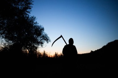 grim reaper, the death itself, scary horror shot of Grim Reaper holding scythe