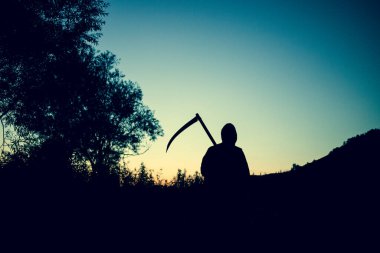 grim reaper, the death itself, scary horror shot of Grim Reaper holding scythe