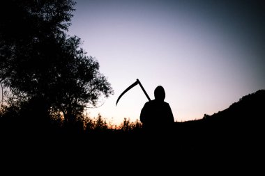 grim reaper, the death itself, scary horror shot of Grim Reaper holding scythe