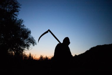 grim reaper, the death itself, scary horror shot of Grim Reaper holding scythe