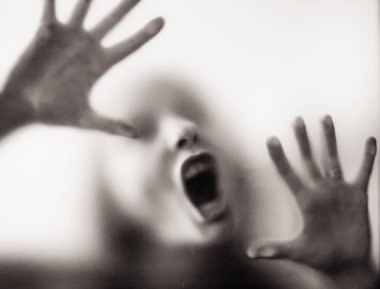scary picture of hands behind glass, horror ghost woman behind door, Halloween  concept