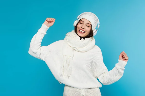 Happy Woman Warm Clothes Headphones Dancing Isolated Blue — Stock Photo, Image