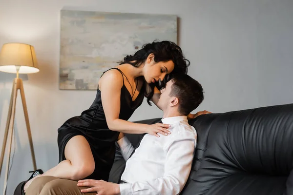 Brunette Young Woman Black Slip Dress Seducing Boyfriend Sofa — Stock Photo, Image