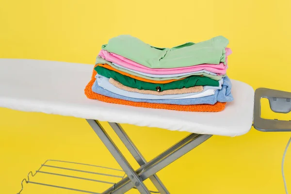 Stack Clean Laundry Ironing Board Isolated Yellow — Stock Photo, Image