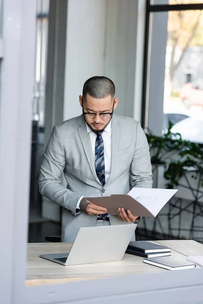 Asian Businessman Holding Folder Blueprint Notebooks Laptop Desk — Stock Photo, Image