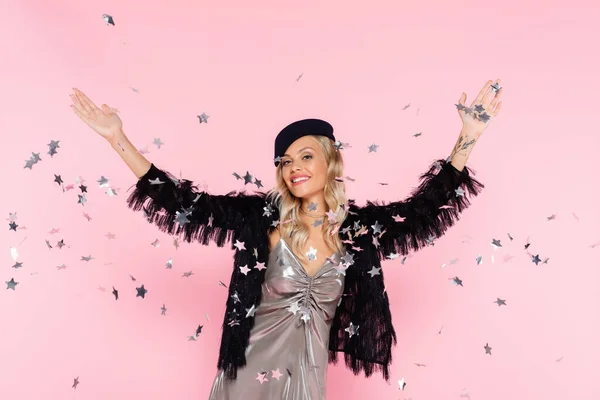 Happy Woman Elegant Clothes Looking Camera While Throwing Sparkling Confetti — Stock Photo, Image