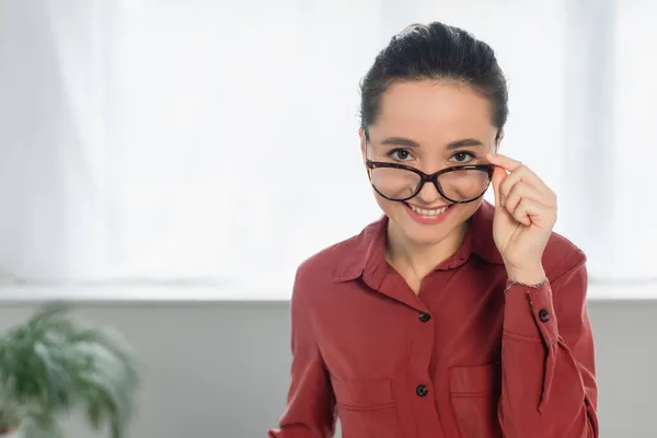 Happy Young Teacher Adjusting Eyeglasses Looking Camera — Stock Photo, Image